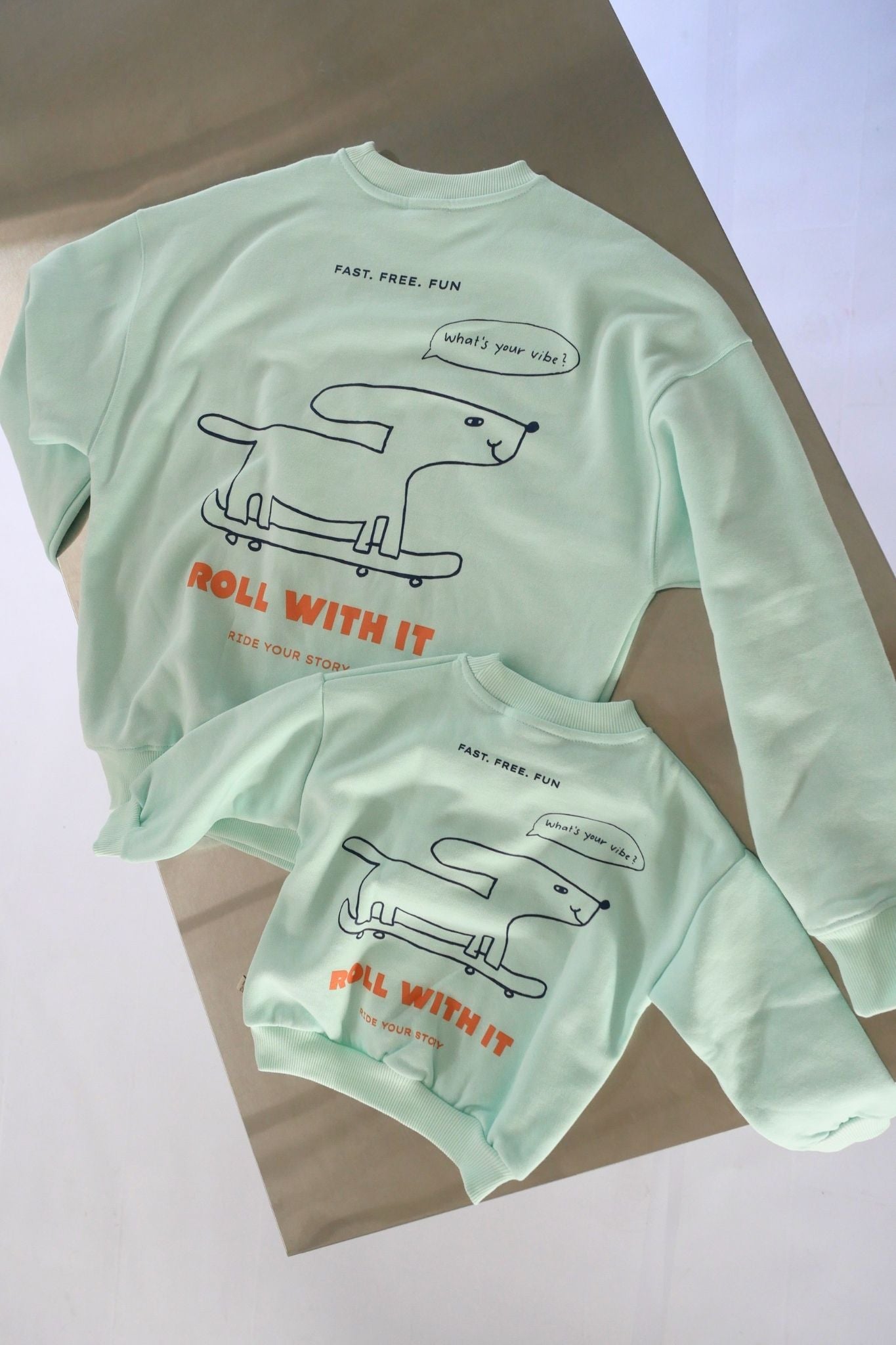 Women Roll with it Sweater Soft Aqua